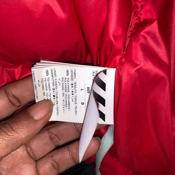 . Authentic off-white red down jacket .Original price $2100.00 .